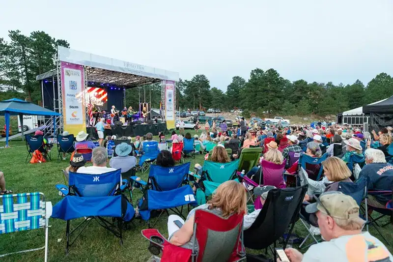 people sitting in front of stage